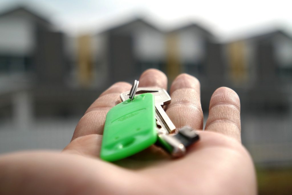 Home keys in a person's hand
